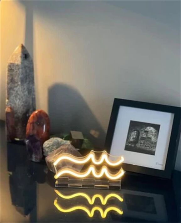 Brighten up your bar, home, and office ambiance with the Wave Line LED Neon Sign.