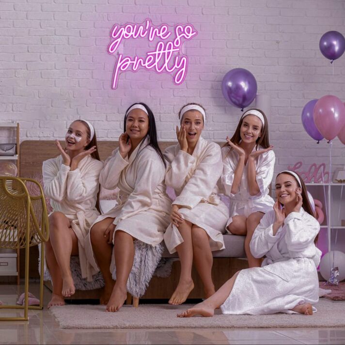 Brighten Up Your Bar, Office, or Bedroom with the Playful Glow of the Deep Pink "You're So Petty" Neon Sign.