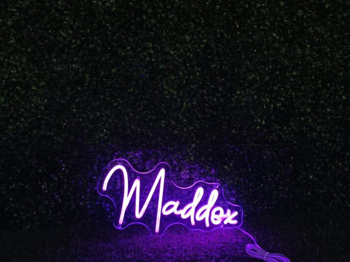 Brighten Up Your Space: Maddox Purple LED Neon Sign, Perfect for Home Decor, Bars, and Celebratory Events.