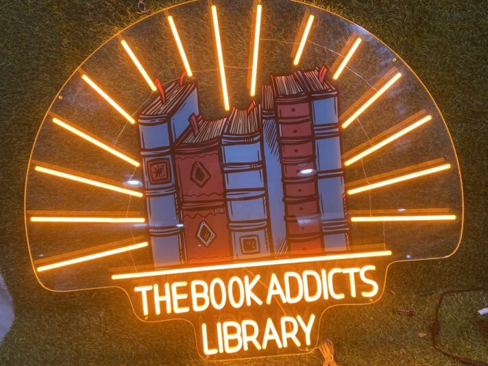 Brighten Your Reading Nook, Office, or Storefront with The Book Addicts Library UV Print LED Neon Sign.