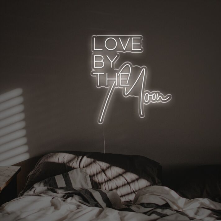 Brighten Your Wedding, Home, and Parties with the Enchanting Love By The Moon LED Neon Sign.