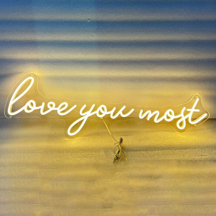 'Love you most' neon sign