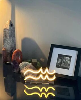 Brighten up your bar, home, and office ambiance with the Wave Line LED Neon Sign.