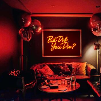 Brighten Your Bar or Game Room Atmosphere with the Playful Glow of &quot;But Did You Die&quot; Orange Neon Sign.
