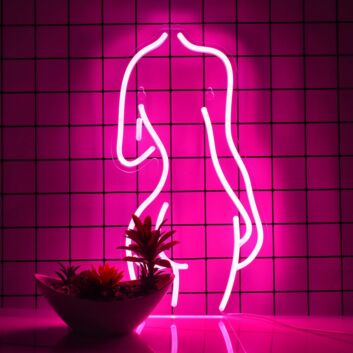 Enhance Your Boutique, Bar, or Bedroom Aesthetics with the Deep Pink Mannequin Woman Neon Sign.
