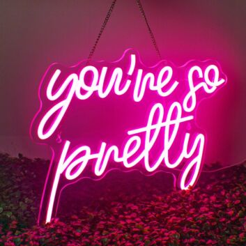 Brighten Up Your Bar, Office, or Bedroom with the Playful Glow of the Deep Pink &quot;You&#039;re So Petty&quot; Neon Sign.
