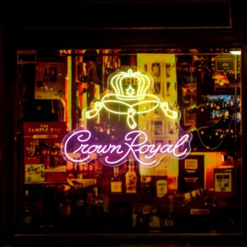 Elevate Your Bar, Office, or Party Ambiance with the Crown Royal Words Crown Bar Neon Sign.