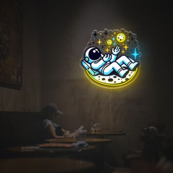 Bring cosmic elegance to your bar, home office, or space-themed events with Astronaut Lying Down On The Moon LED Neon Acrylic Artwork.