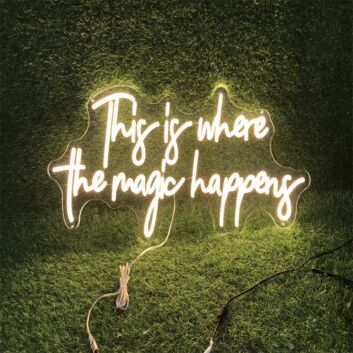 Transform any space into a mesmerizing retreat - ideal for weddings, home decor, and cozy cafes with the Warm White This Is Where The Magic Happens LED Neon Sign.