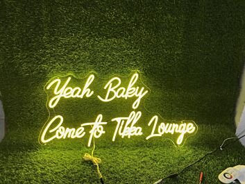 Brighten Up Your Bar, Restaurant, or Home Party Ambiance with the Yeah Baby Come To Tikka Lounge Yellow LED Neon Sign.