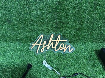 Brighten Your Office, Store, or Bar Ambiance with the Ashton Orange LED Neon Sign.
