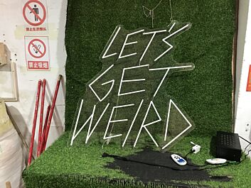 Brighten Your Office, Bar, or Next Event with the Lets Get Weird White LED Neon Sign.