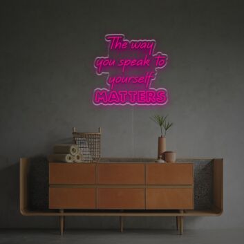 Elevate your home office and inspire self-care with The Way You Speak To Yourself Matters LED Neon Sign.