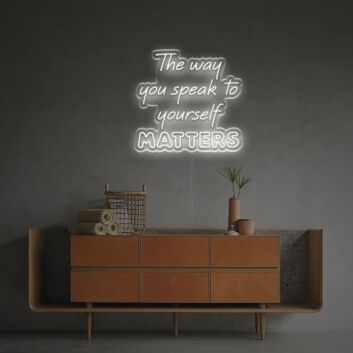 Elevate your home office and inspire self-care with The Way You Speak To Yourself Matters LED Neon Sign.