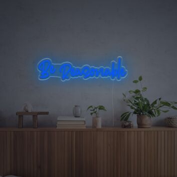 Enhance your bar, wedding, or home ambiance with the Be Reasonable LED Neon Sign.