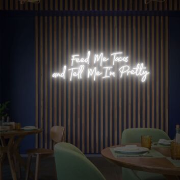 Brighten Your Kitchen or Add Fun to Your Next Taco Night with the Feed Me Tacos And Tell Me I&#039;m Pretty Neon Sign.
