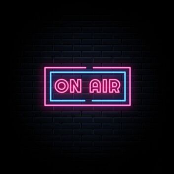 Led On Air Neon Sign Hung On Brick Background