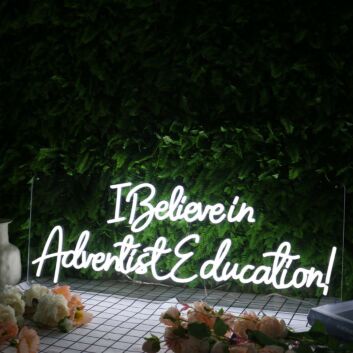 I Believe In Adventist Education White Neon Sign