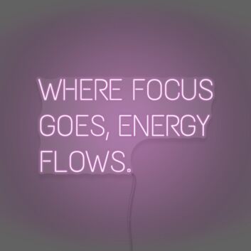 Where Focus Goes Energy Flows Neon Lettering Inspiring Concentration and Success