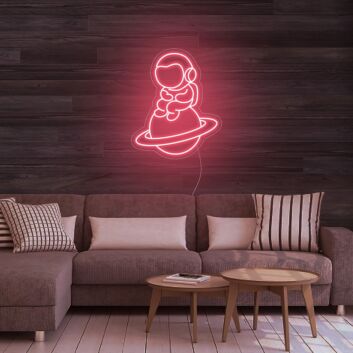 Astronaut Sitting On Planet Neon Sign for Space Enthusiasts