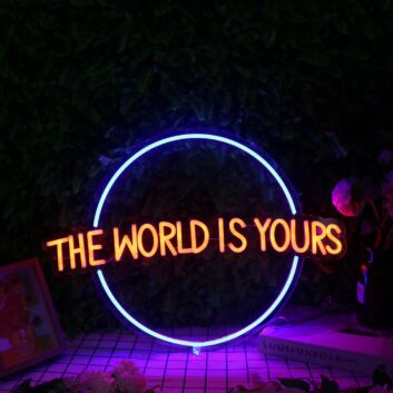 The World Is Yours Orange Neon Sign for Inspirational and Positive Spaces