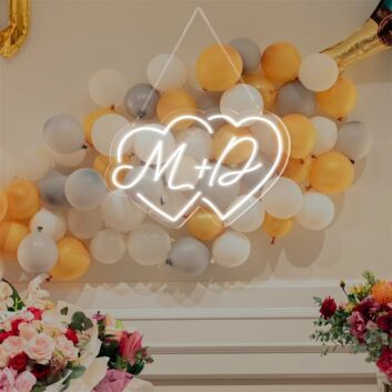Add a Romantic Glow to Your Wedding, Anniversary, or Bedroom with the Couple Initials Heart Shapes M D Personalized LED Neon Sign.