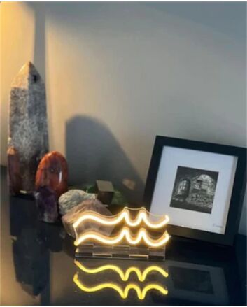 Brighten up your bar, home, and office ambiance with the Wave Line LED Neon Sign.