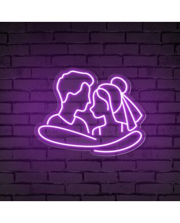Add a Romantic Glow to Your Bedroom, Wedding, or Anniversary Celebration with the Cuddling Couple Shape Neon Sign.