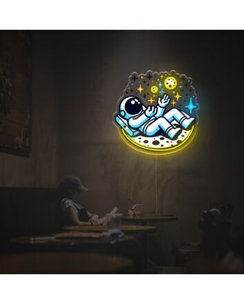 Bring cosmic elegance to your bar, home office, or space-themed events with Astronaut Lying Down On The Moon LED Neon Acrylic Artwork.