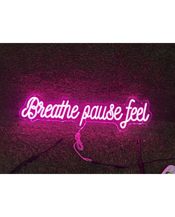Brighten Up Your Space: Breathe Pause Feel Pink LED Neon Sign Perfect for Home Decor, Relaxing Office Environments, and Trendy Bar Settings.
