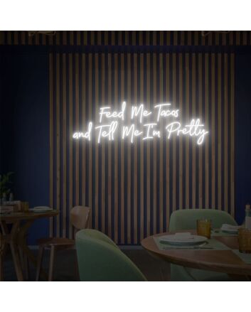 Brighten Your Kitchen or Add Fun to Your Next Taco Night with the Feed Me Tacos And Tell Me I&#039;m Pretty Neon Sign.