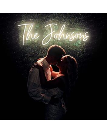 The Johnsons Neon Name Signs Warm White Neon Sign Hung On Grass Wall