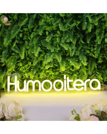Humanitera Yellow Neon Sign