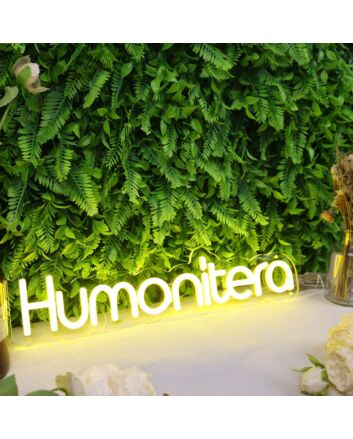 Humanitera Yellow Neon Sign