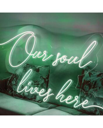 ”Our soul lives here“ neon sign
