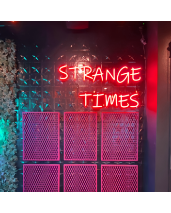 Strange Times: Illuminate Your Space with an Eccentric Vibe - Neon Sign