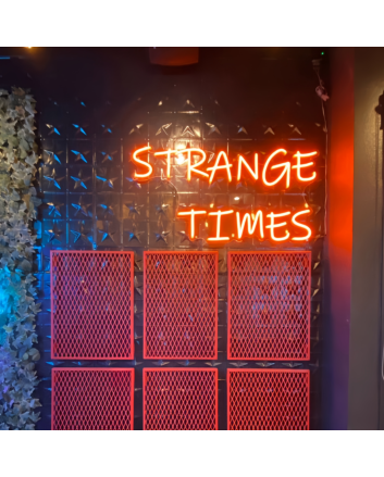 Strange Times: Illuminate Your Space with an Eccentric Vibe - Neon Sign