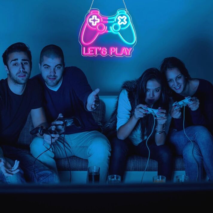 Brighten Up Your Gaming Room, Bar, or Teen's Bedroom with the Deep Pink And Ice Blue Patchwork Gamepad Neon Sign.