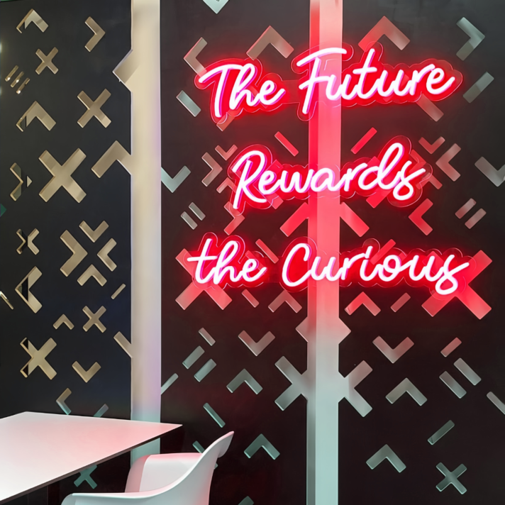 'The Future Rewards The Curious ' Neon Sign