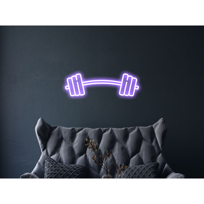 Barbell Neon Sign Hung On The Wall Of A Room