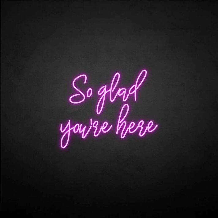 'So glad you're here' neon sign
