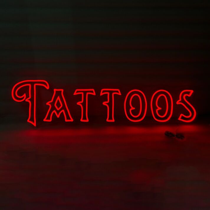 Tattoos Illuminate Your Space with Neon Art